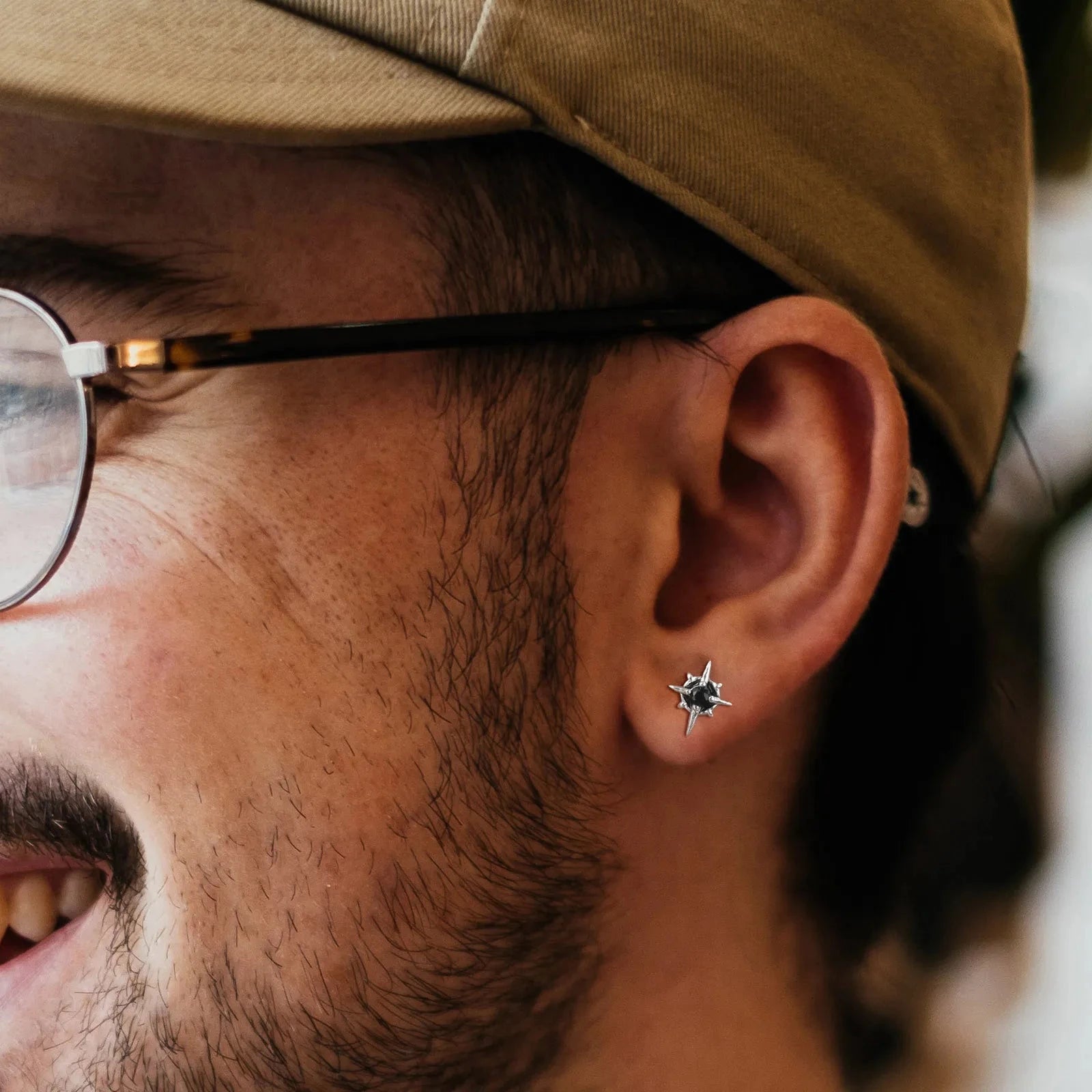 Pendientes de botón estrella con circonita