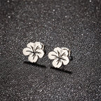 Pendientes de botón flores mujer plata