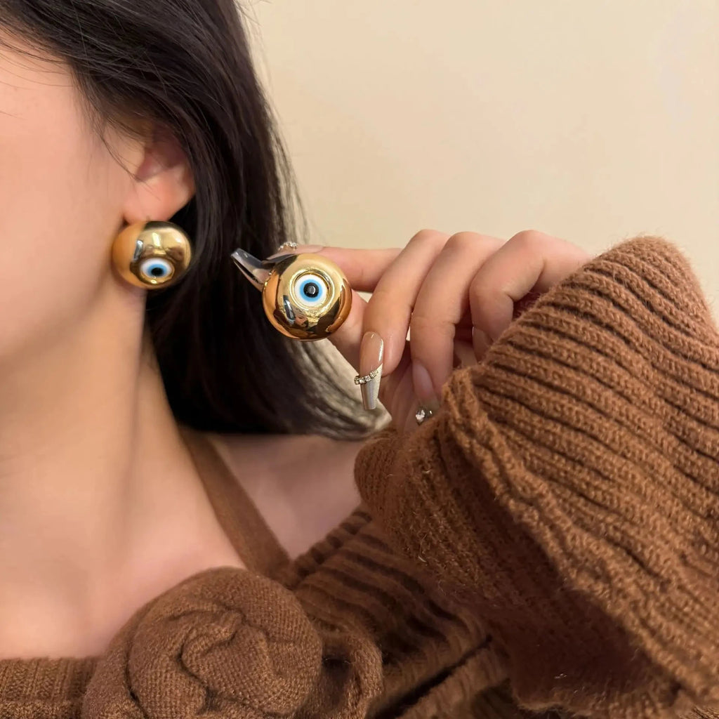 Pendientes de botón vintage contra el mal de ojo oro