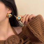 Pendientes de botón vintage contra el mal de ojo oro