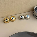 Pendientes de botón vintage contra el mal de ojo oro