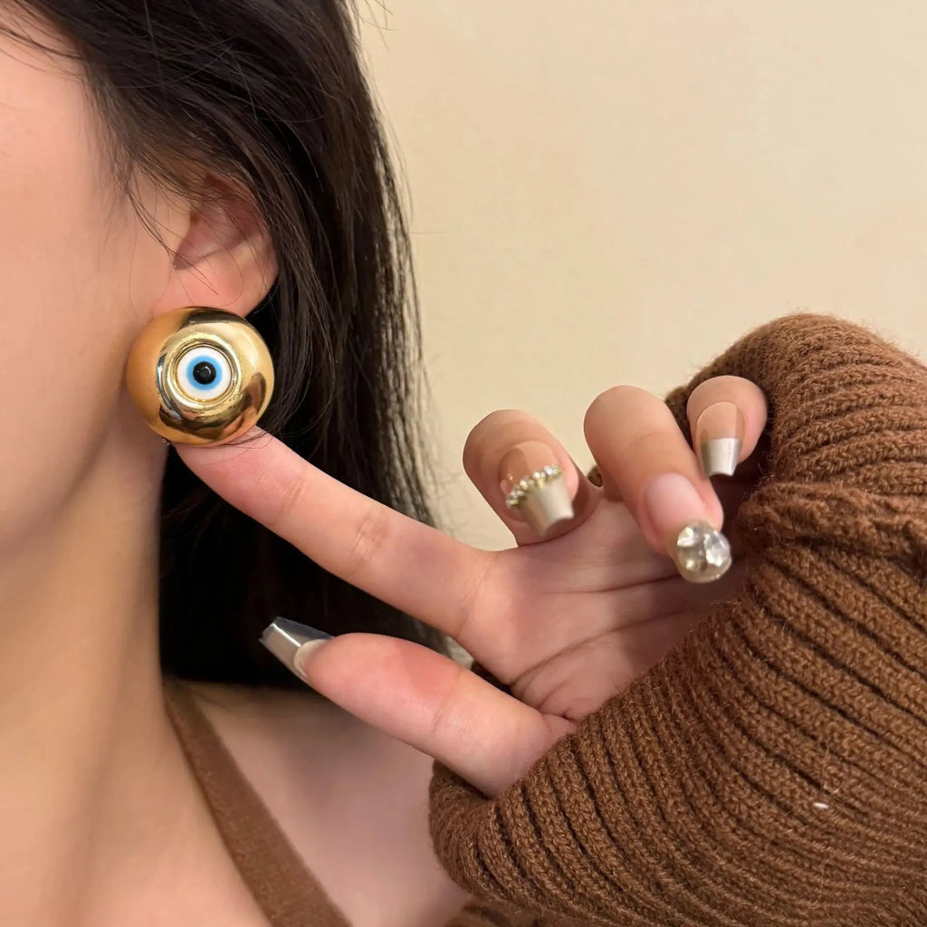 Pendientes de botón vintage contra el mal de ojo oro