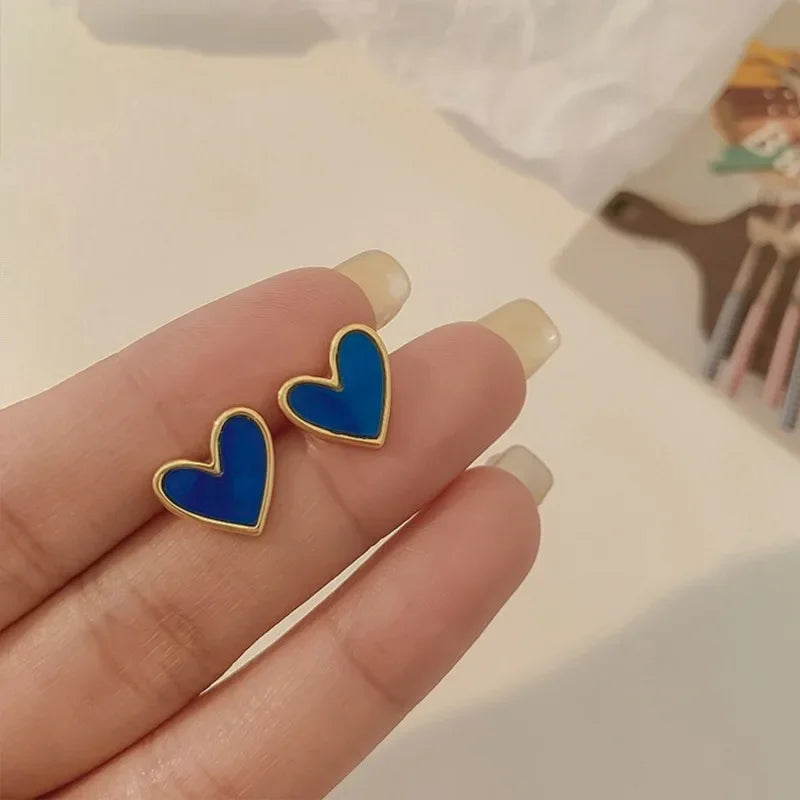 Pendientes de corazón efecto nacarado azul