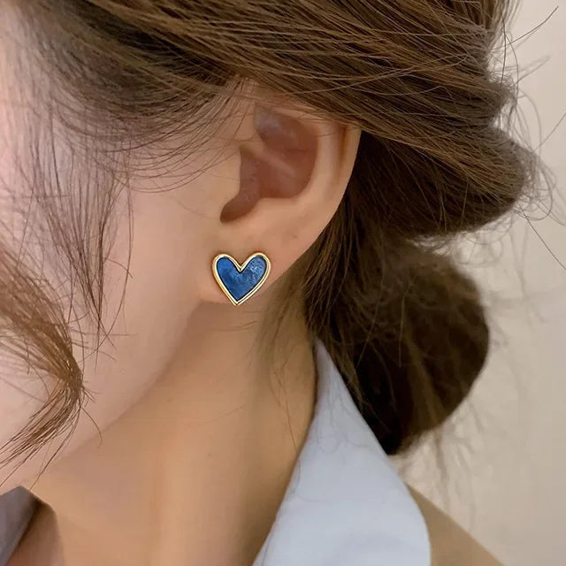 Pendientes de corazón efecto nacarado azul