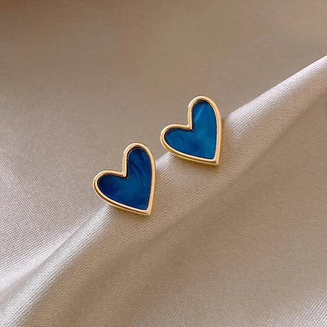 Pendientes de corazón efecto nacarado azul