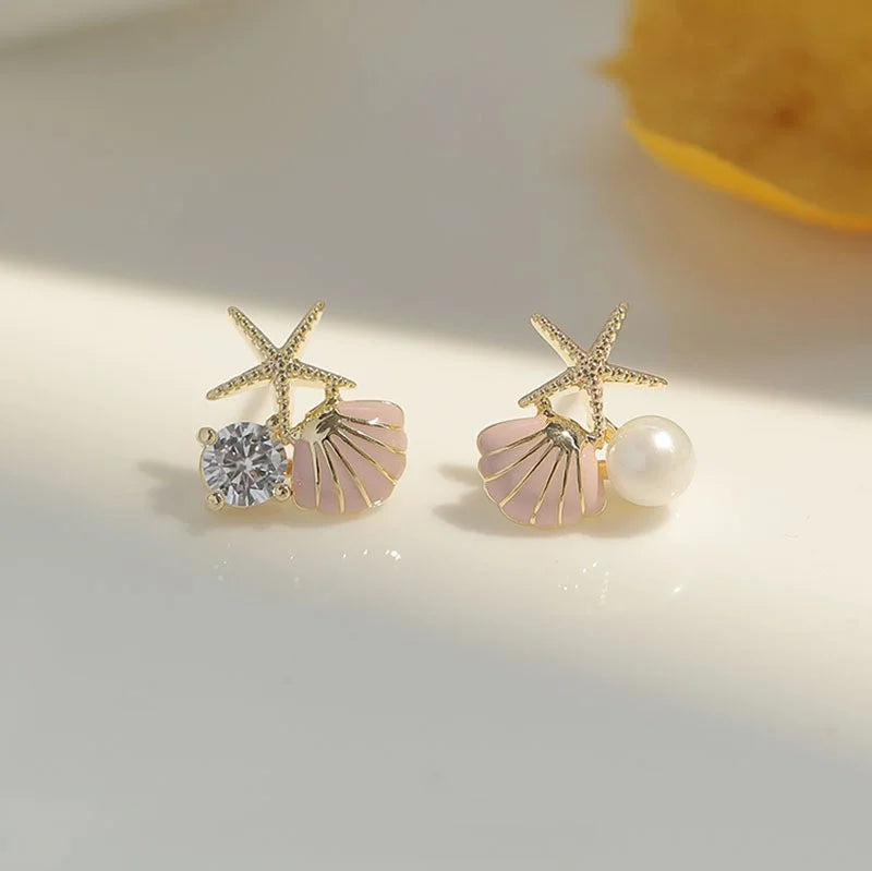 Pendientes de concha asimétricos rosa
