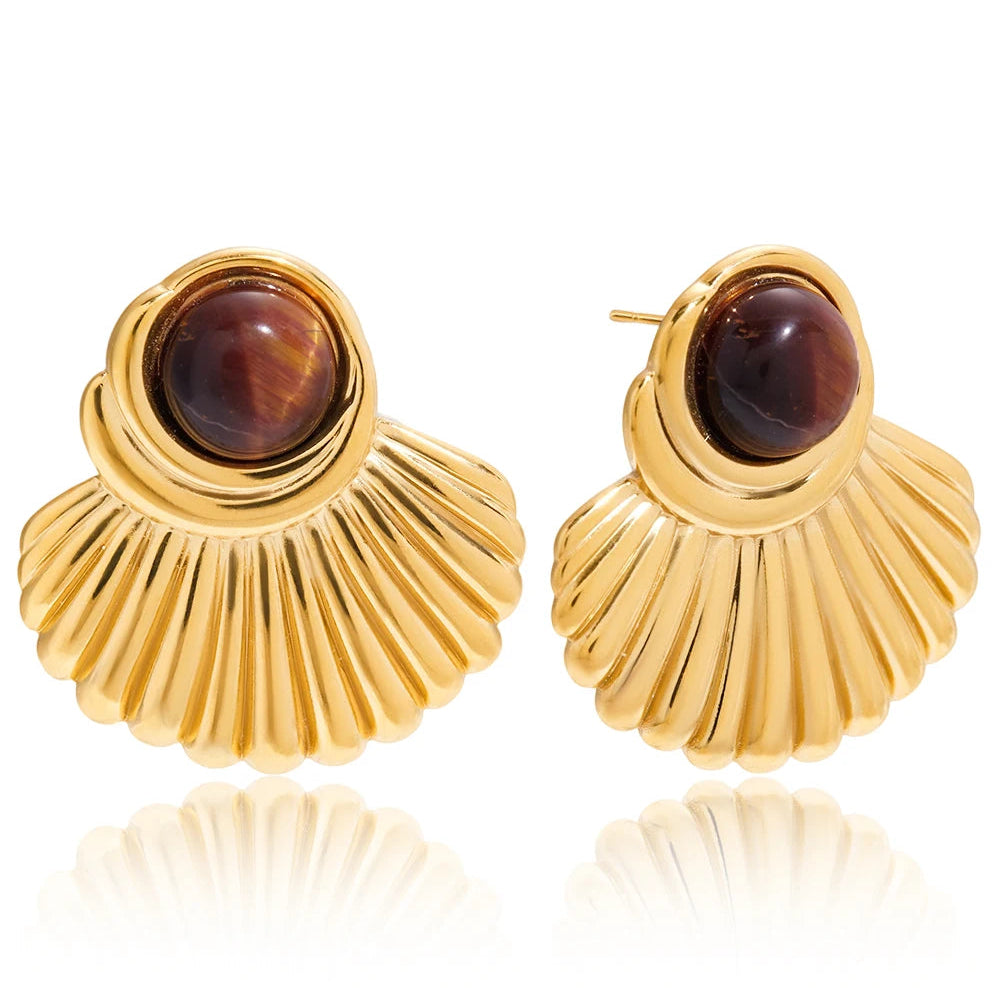 Gold shell earrings and tiger's eye stone