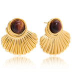 Gold shell earrings and tiger's eye stone