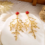 Pendientes de coral dorados