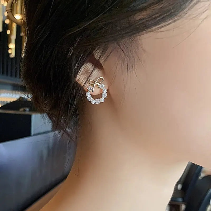 Pendientes de Aro con Perlas y Lazo de Mariposa