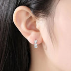 Pendientes de aro con trío de flores