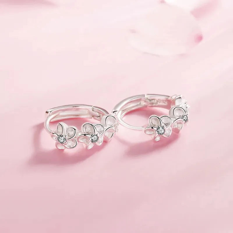 Pendientes de aro con trío de flores