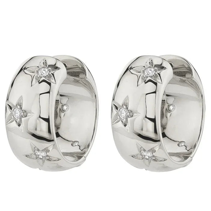 Pendientes de aro abombados con estrellas grabadas plateado