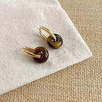 Hoop earrings with round tiger's eye stone beads