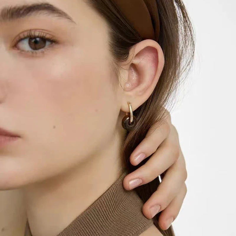 Hoop earrings with round tiger's eye stone beads