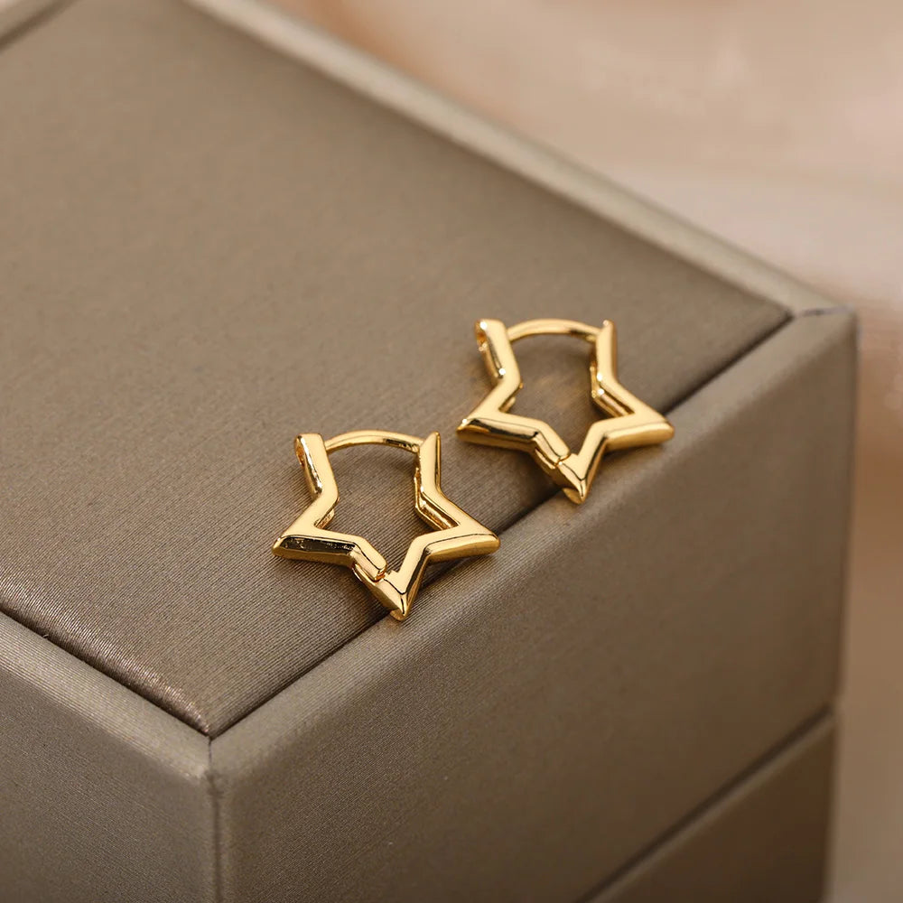 Pendientes de aro estrellas geométricas oro