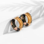 Pendientes de aro con flores de rosa esmaltadas negras