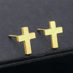 Pendientes de cruz gruesa de oro