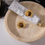 Gold-tone crescent moon earrings in tiger's eye stone