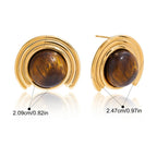 Gold-tone crescent moon earrings in tiger's eye stone