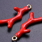 Pendientes dorados coral rojo
