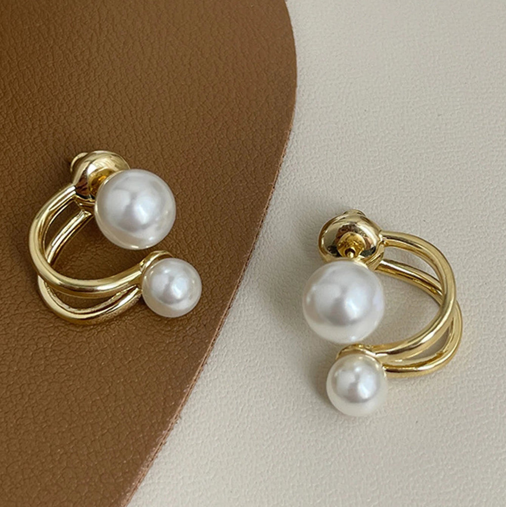 Pendientes de doble perla blanca