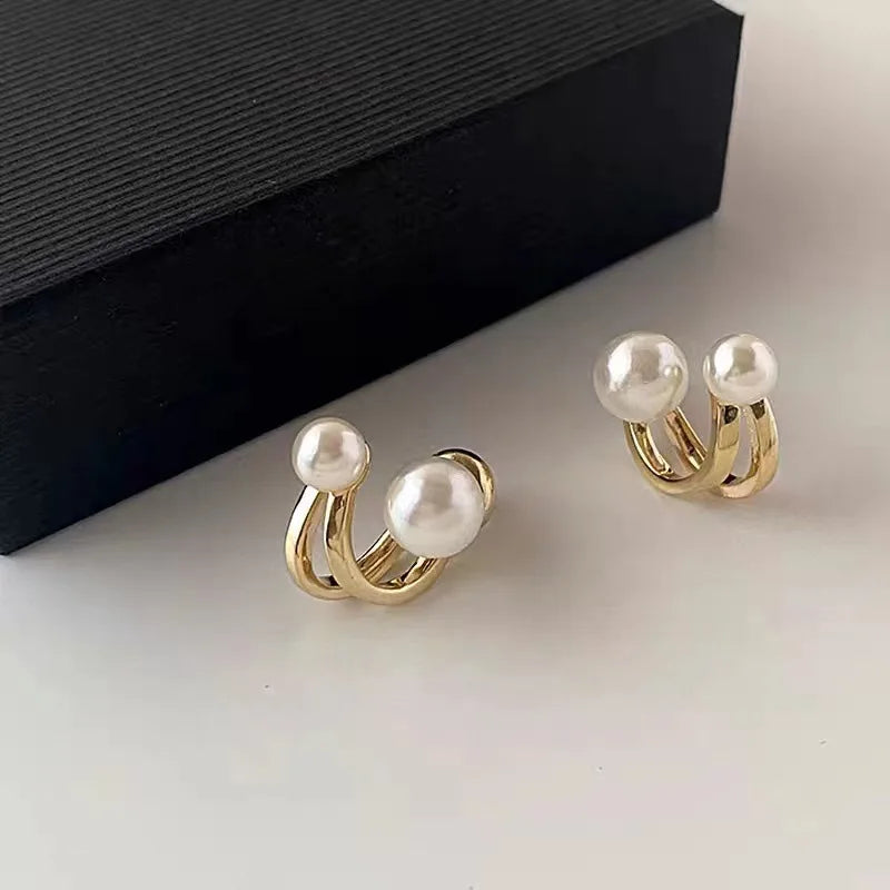 Pendientes de doble perla blanca