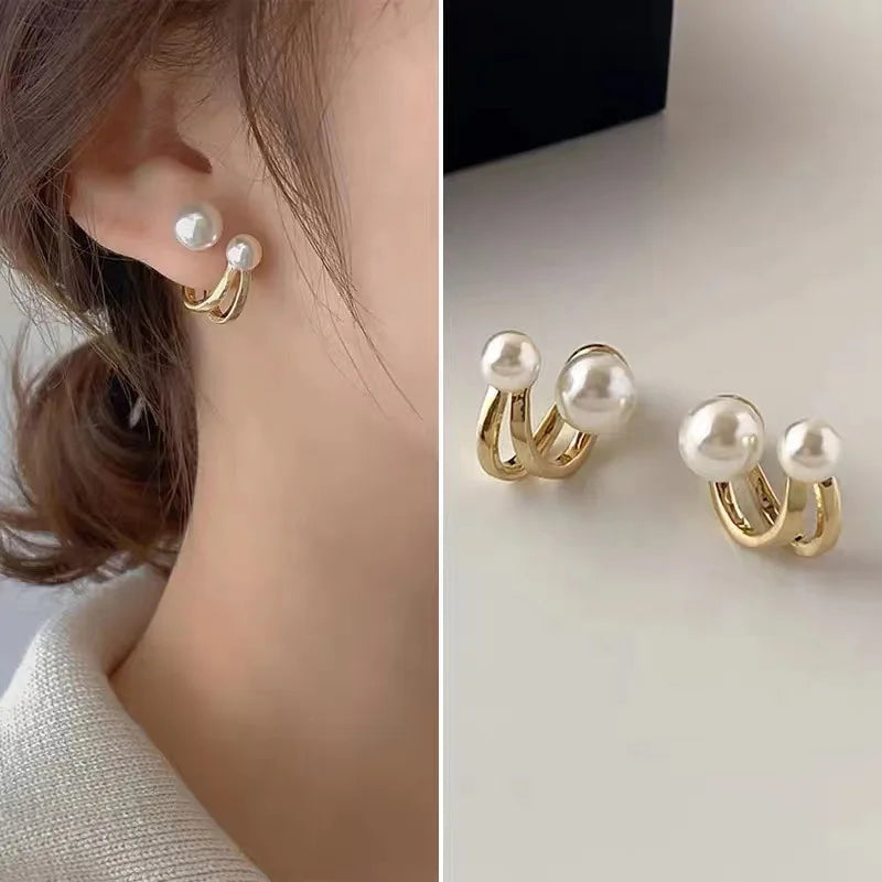 Pendientes de doble perla blanca