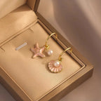 Pendientes esmaltados con concha y perla rosa