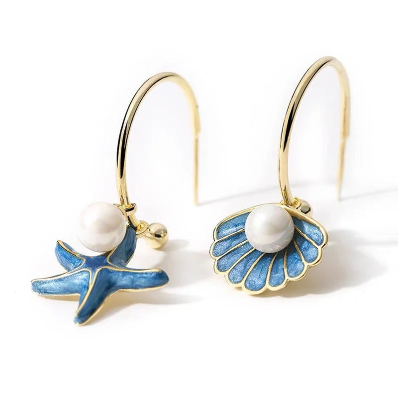 Pendientes esmaltados con concha y perla azul