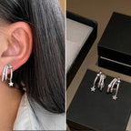 Pendientes de estrella fugaz multicapa con strass