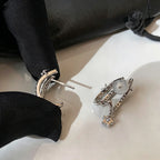 Pendientes de estrella fugaz multicapa con strass