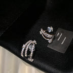 Pendientes de estrella fugaz multicapa con strass