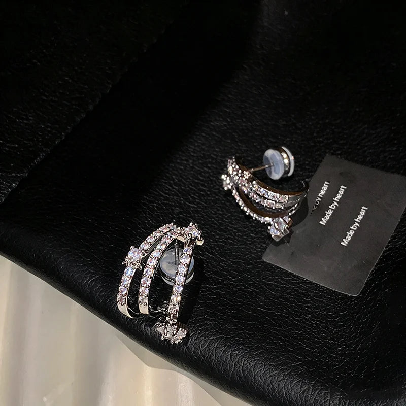 Pendientes de estrella fugaz multicapa con strass