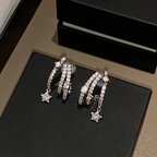 Pendientes de estrella fugaz multicapa con strass