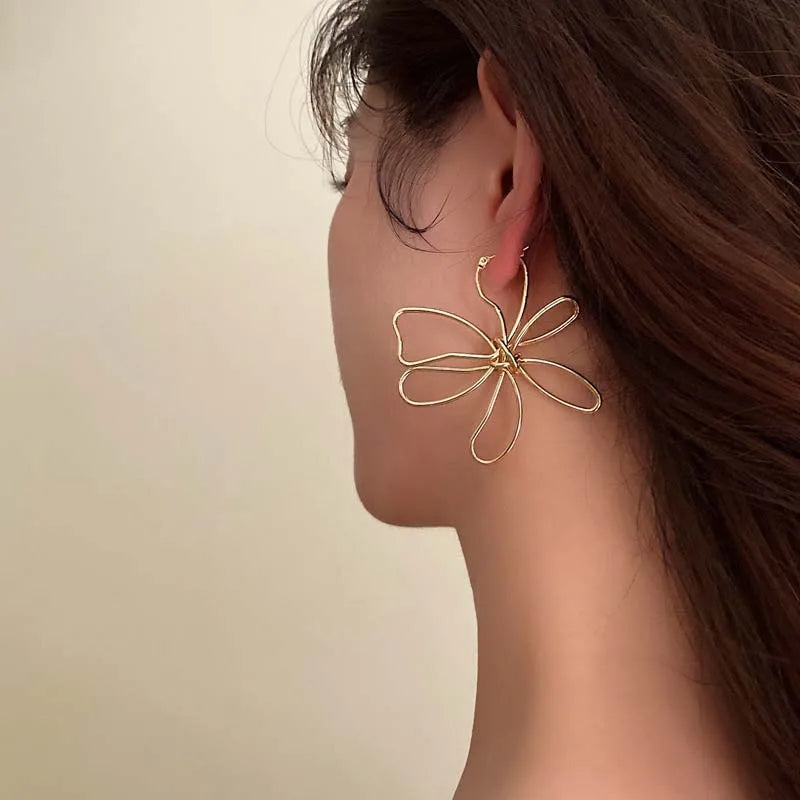 Pendientes de Flores Clavo Vintage Asimétricos oro
