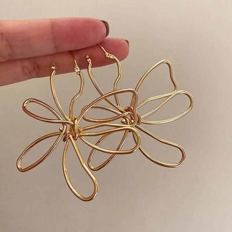 Pendientes de Flores Clavo Vintage Asimétricos oro