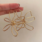 Pendientes de Flores Clavo Vintage Asimétricos oro