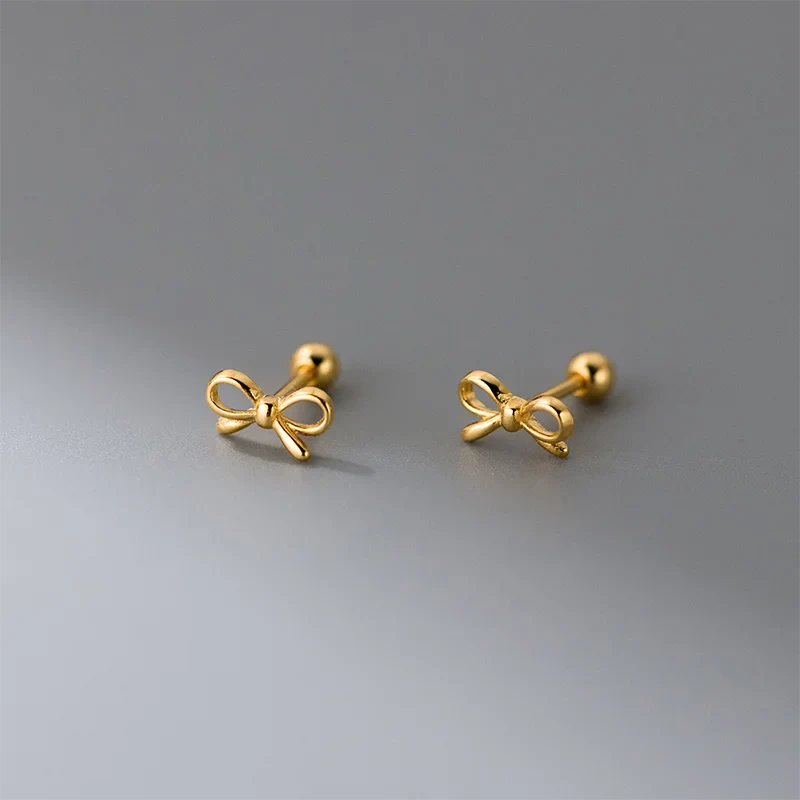 Pendientes minimalistas lazo de moño dorado
