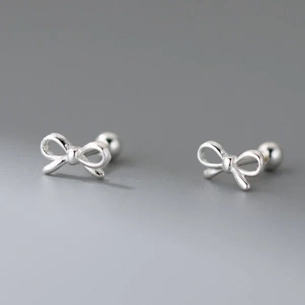 Pendientes minimalistas lazo de moño plateado