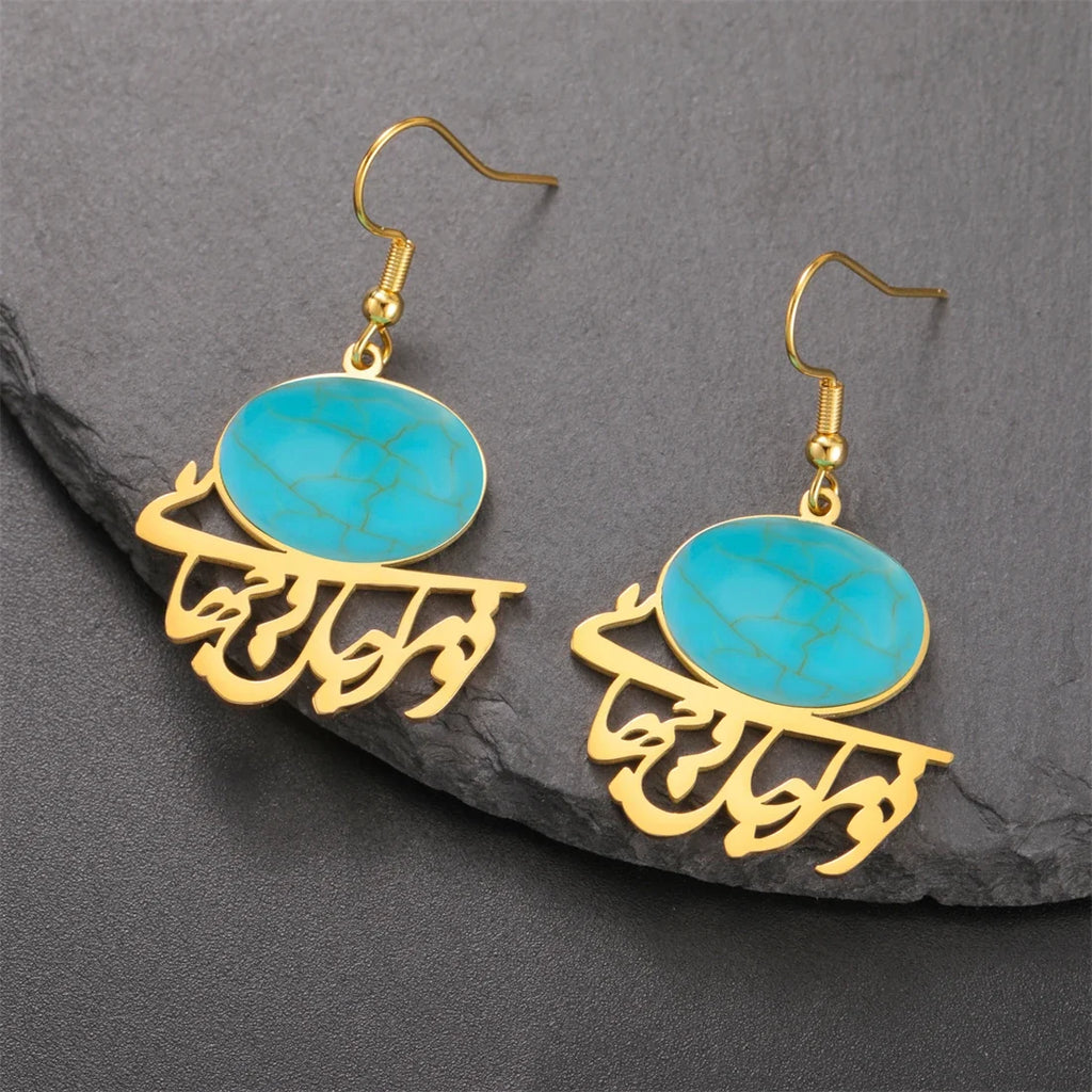 Pendientes orientales con caligrafía árabe y piedra turquesa oro
