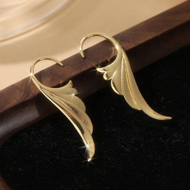 Pendientes colgantes alas de ángel para mujer dorados