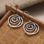 Pendientes colgantes con espiral cincelada