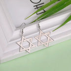 Pendientes colgantes hexagonales con el símbolo judío de la <span data-glossary-id="star-of-david">estrella de David</span> en plata