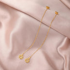 Pendientes largos colgantes con la <span data-glossary-id="etoile_de_david">estrella de David</span> símbolo judío redonda oro