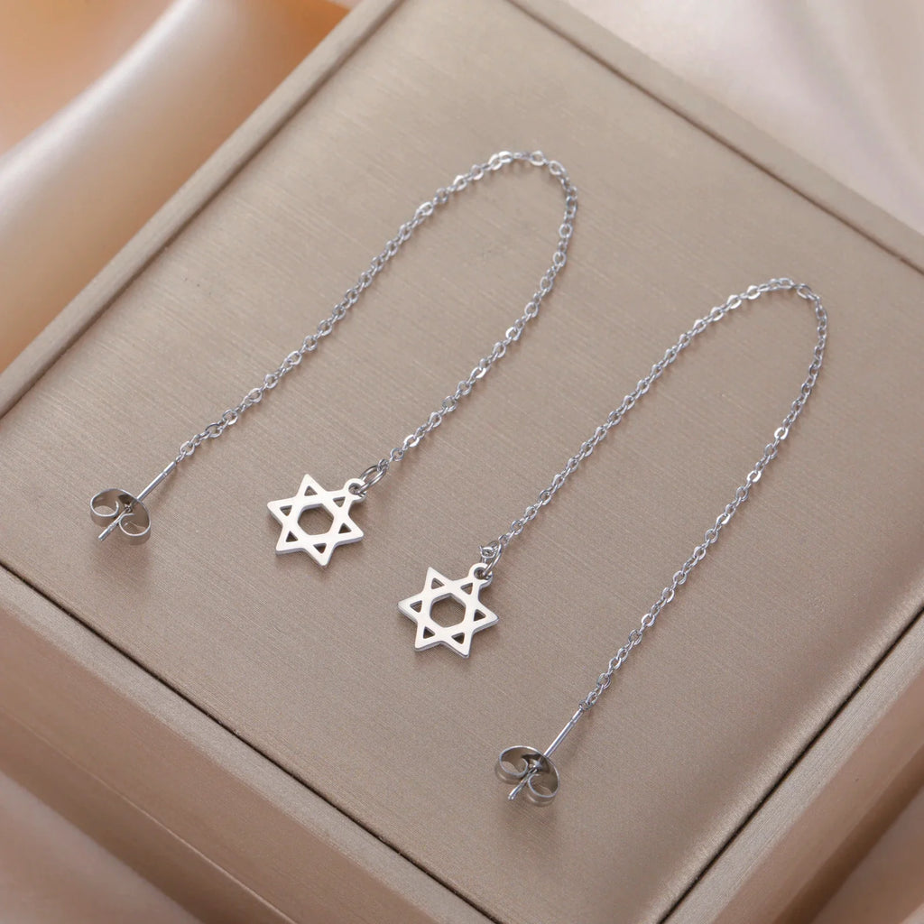 Pendientes largos colgantes con la <span data-glossary-id="etoile_de_david">estrella de David</span> símbolo judío plata