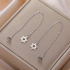 Pendientes largos colgantes con la <span data-glossary-id="etoile_de_david">estrella de David</span> símbolo judío plata
