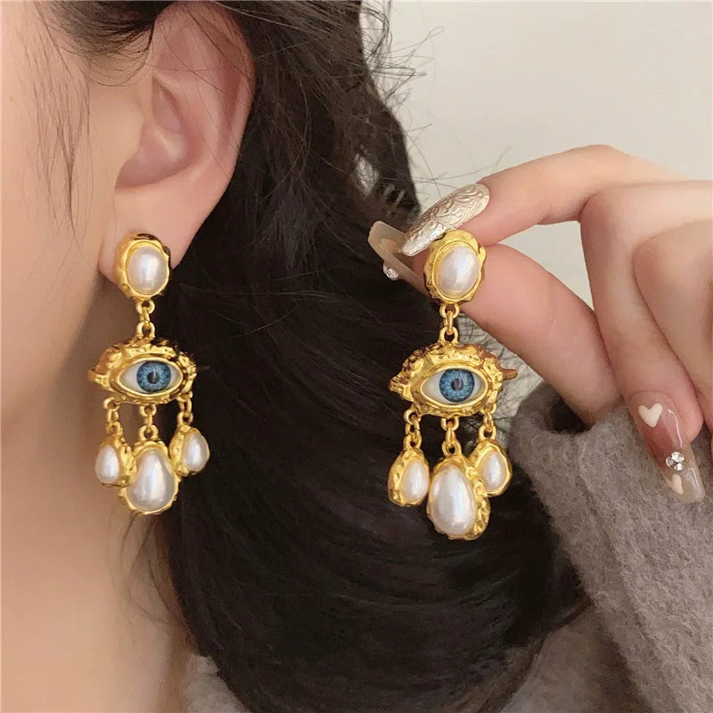 Pendientes Colgantes Ojo Azul y Perlas oro