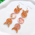 أقراط متدلية بمراحل القمر برتقالي