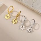 Pendientes colgantes para mujer con la <span data-glossary-id="etoile-de-david">estrella de David</span> simbólica judía 